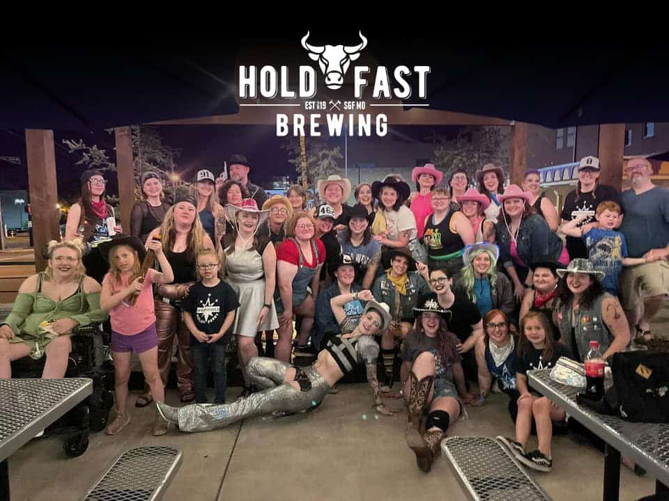 An image of members of Springfield Roller Derby at an after party at Hold Fast Brewing with a black gradient from the top and the Hold Fast Brewing logo in white.